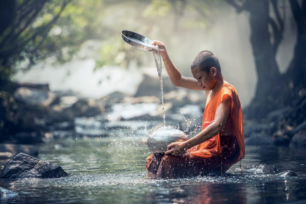 boy, monk, river-1807518.jpg