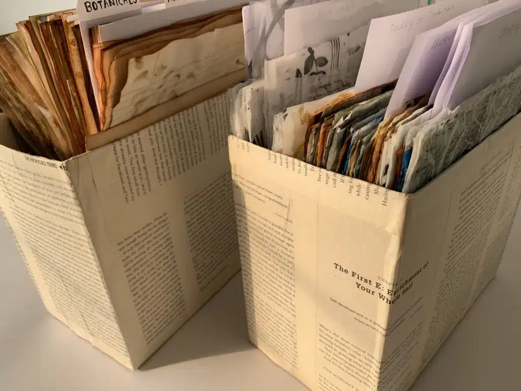 https://debasreedeyart.com/wp-content/uploads/2023/11/Cardboard-box-cover-with-book-pages-for-storing-mixed-media-collage-papers-deli-coffee-dye-debasree-dey-art-5861-1024x768.jpg.webp